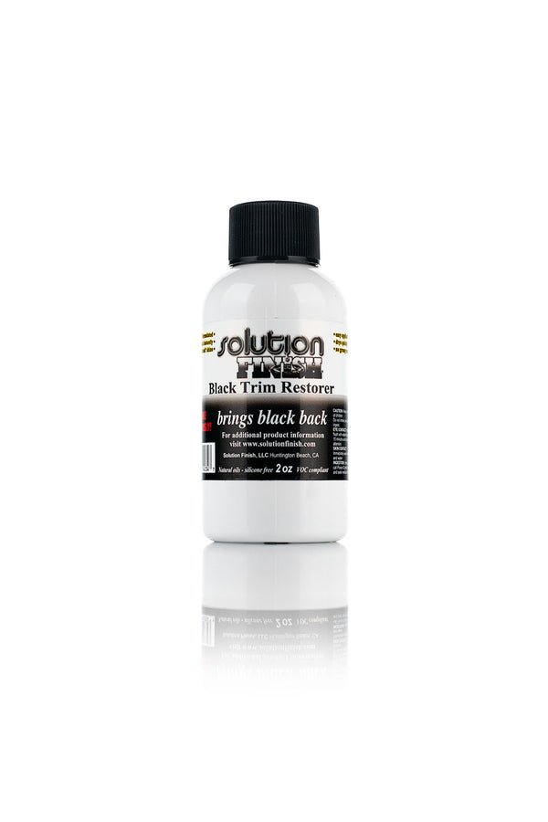 A bottle of Solution Finish on a white background.