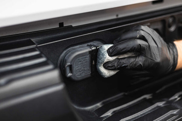 Armour Detail Supply Trim Plus on an applicator being applied to black trim.