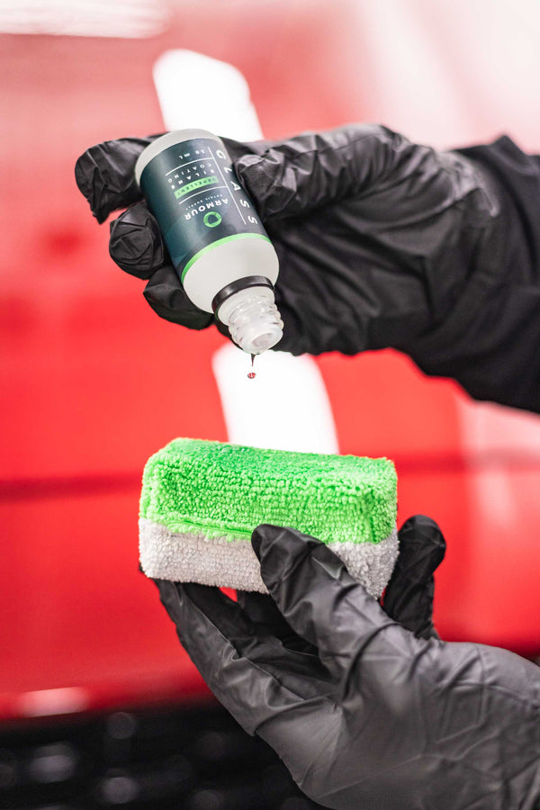 Armour Detail Supply Glass Coating being applied to a sponge.