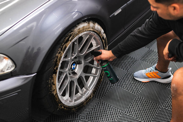 Armour Detail Iron being sprayed onto tire rim.