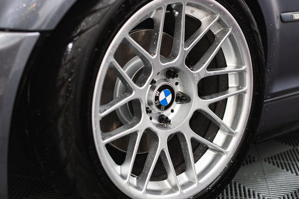 A closeup of a car tire.