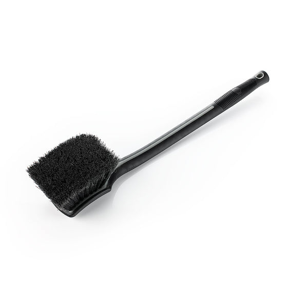 A black Detail Factory fender well brush on a white background.