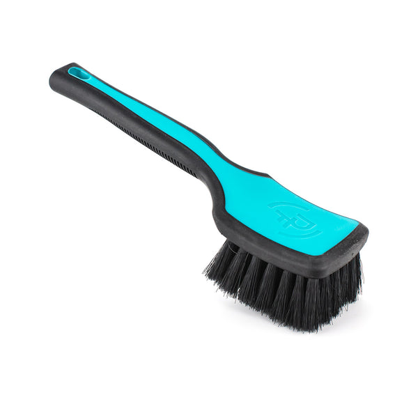 A Riptide Tire Brush on a white background.