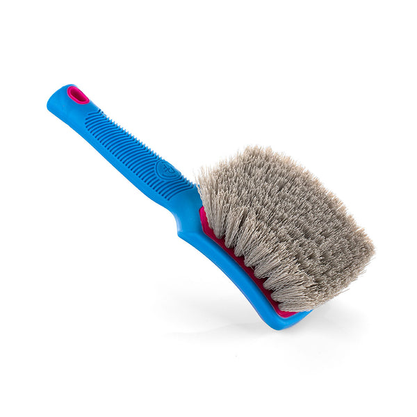 An XL pink Detail Factory Tire Scrub Brush on a white background.