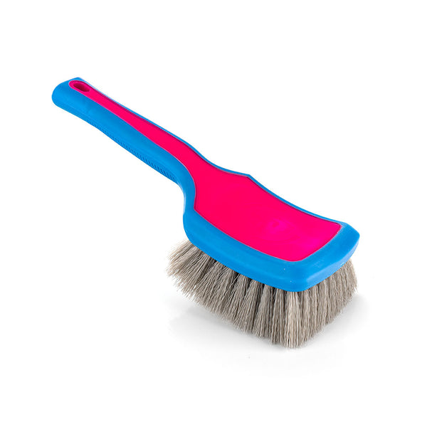 An XL pink Detail Factory Tire Scrub Brush on a white background.
