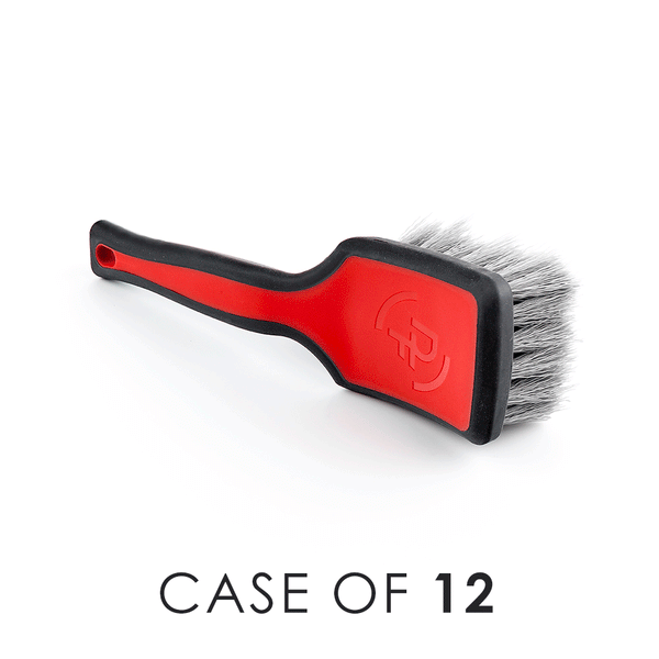 A red Progrip Tire Brush on a white background with the text 'Case of 12'.