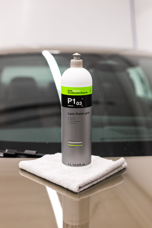 Koch Chemie Lack Polish Grun p1.03 being used with a towel on a Mazda 3.