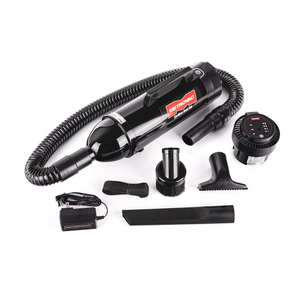 Metrovac Cordless Hand Vac with all the attachments on a white background.