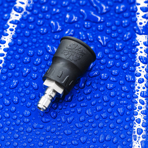 A close up of a TRC Ultra H2O Spray Nozzle on a watery blue background.