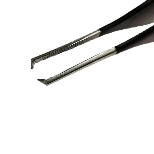 A closeup of the end of the Yellotools Tweezer over a white background.