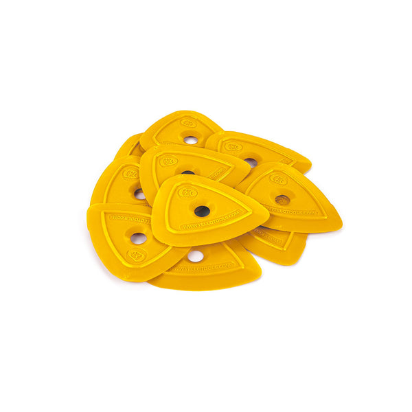 A pile of yellow Yel-Lo-Pleks on a white background.