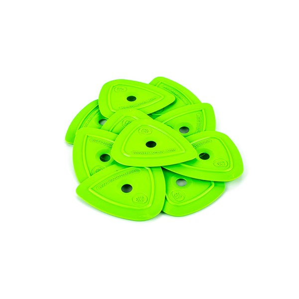 A pile of green Yel-Lo-Pleks on a white background.