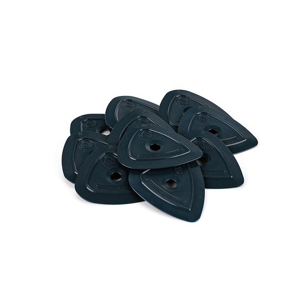 A pile of black Yel-Lo-Pleks on a white background.