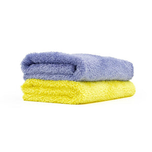 A stack of two Eagle Edgeless 350 16x16 microfiber towels from The Rag Company. The top is lavender and the bottom is yellow