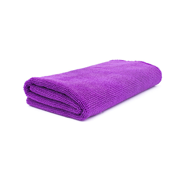 A single Premium Pearl Edgeless towels from The Rag Company in a purple color.