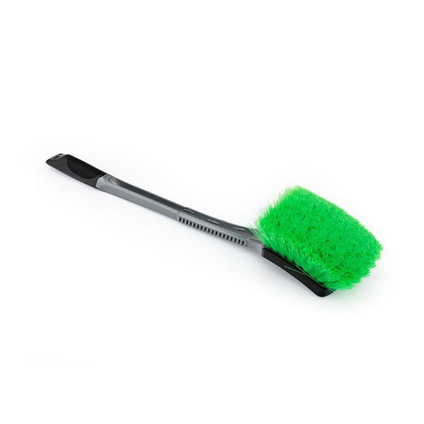 A green bristle Wheel and Body Brush on a white background.