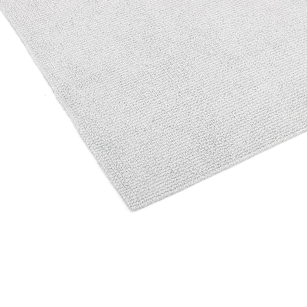 A close up of the edgeless border and corner of an Ice grey Edgeless Pearl microfiber towels from The Rag Company.