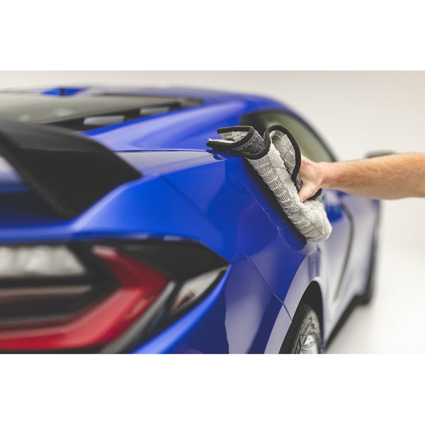 Using the Gauntlet towel from the Rag Company to dry the exterior of a 2022 Chevrolet C8 Corvette. These towels are Ice Grey on One side and Gauntlet Grey on the other with a scratcheless suede edge banding them together.