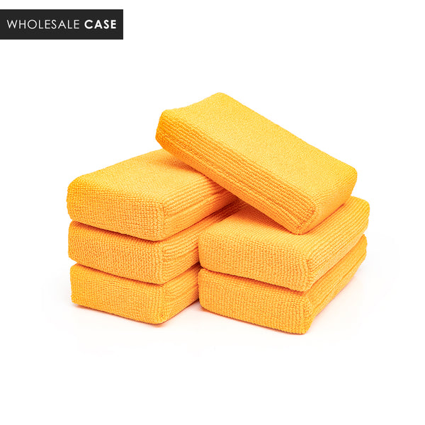 A stack of orange pearl sponges on a white background with the text 'Wholesale Case'.