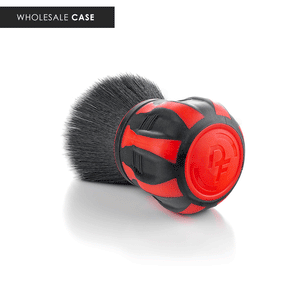 The handle of a red Curveball Brush on a white background with the text 'Wholesale Case'.