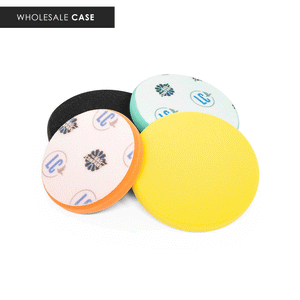 Four different colored (black, green, orange, and yellow) polish pads on a white background with the text 'wholesale case'.