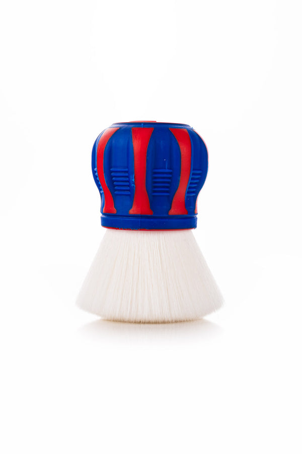 The red, white, and blue Detail Factory Curveball brush on a white background in a 