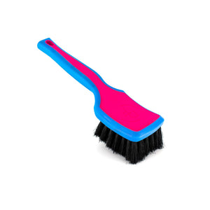 A pink Detail Factory interior Scrub Brush on a white background.
