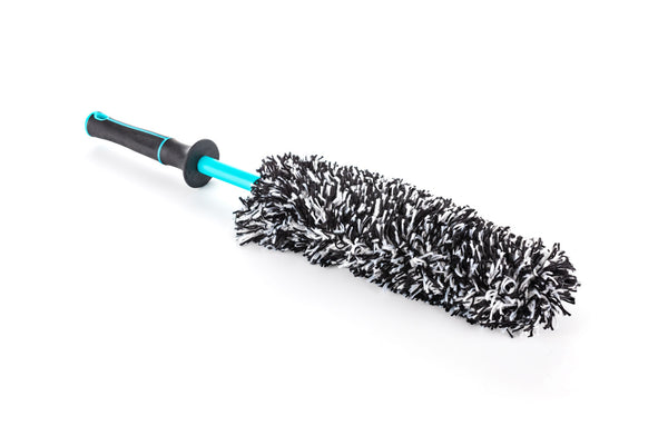 A Riptide Wheel Barrel Brush with it's cover on a white background.