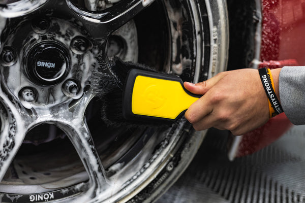 Detail Factory Wheel Face Brush livewire scrubbing a tire rim.