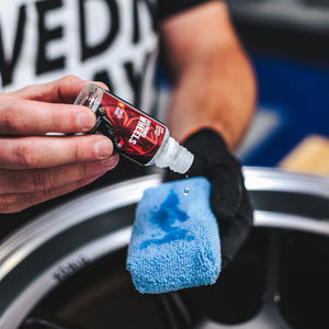 A person pouring Diamond Protech Diamond Wheels on a blue sponge. 