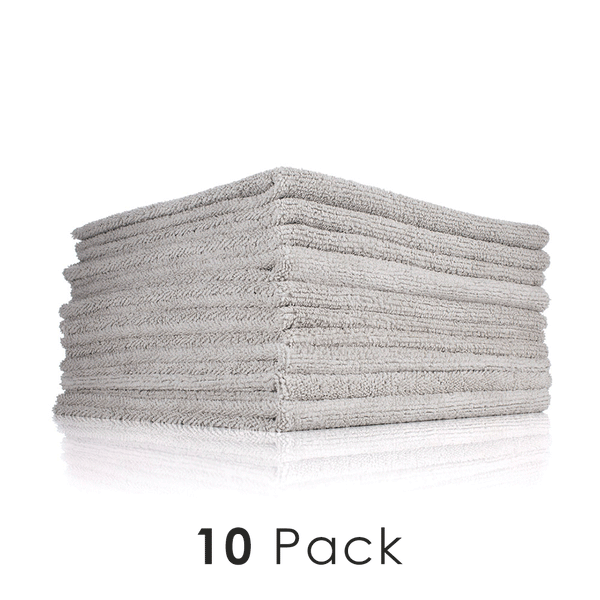 A stack of ice grey Edgeless 300 towels on a white background with the text '10 Pack'.