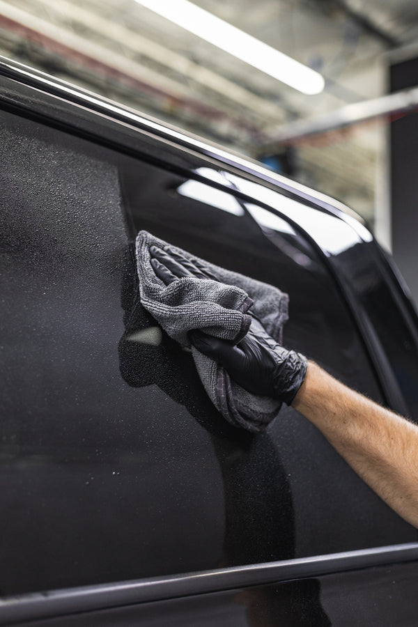 The Liquid8r Heavy Metal FTW drying of black truck passenger window.