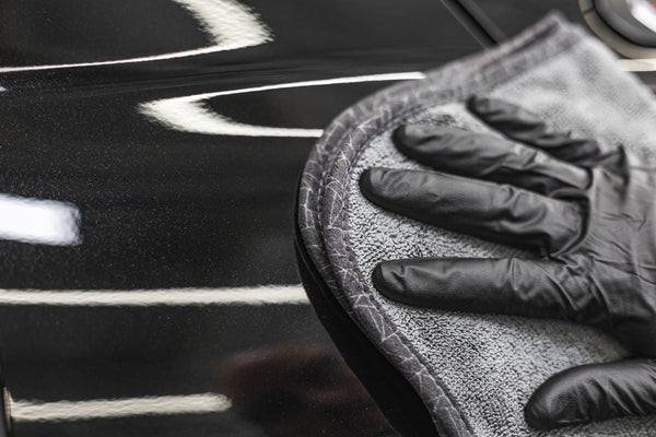 The Liquid8r Heavy Metal FTW drying off a black truck.