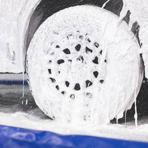 A car tire covered in foam.