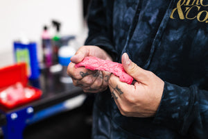KochChemie Abrasive Clay Bar being stretched.