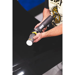 Koch-Chemie Fine Cut 250ml being poured onto a polisher.