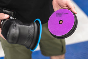 KochChemie Micro Cut Pad being attached to a rupes polisher.