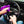 A person spraying the steering wheel with P & S Swift Interior Clean and Shine and wiping it with a purple towel.