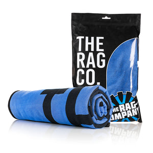 Slim Dryer 25 x 35 Royal Blue rolled view with packaging on a white background.