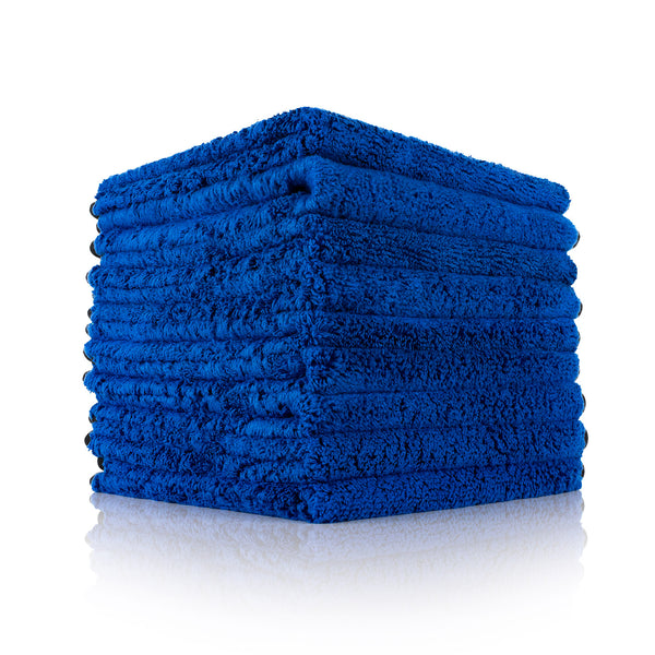 Spectrum 420 blue towel stack on a white background. 