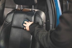 Terry Sponge black 3x5 applying product to leather interior.