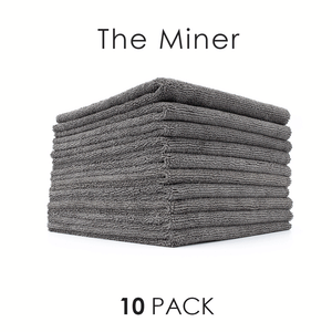 A stack of grey Miner towels with the text "10 Pack" on a white background. 