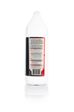 The Last Detail Last Cut Plus 128oz bottle side view on a white background.
