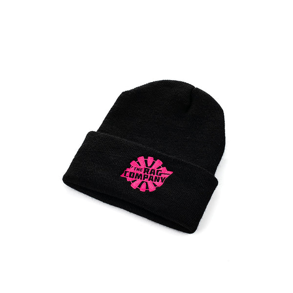A black beanie with a pink embroidered logo for The Rag Company