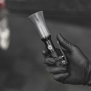TRC Ultra Air Blaster Mini being held in a persons hand.