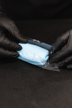 The Rag Company Ultra Clay Bar being taken out of it's packaging.