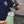 A person holding the top of a TRC Ultra H2O Foam Cannon to show the weighted tube.