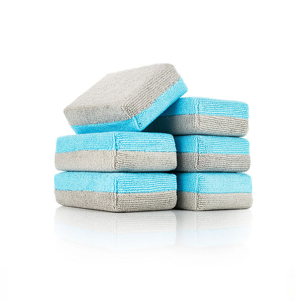An image of a six pack of the new ULTRA No-Soak Coating Applicator from the Rag Company. These microfiber sponges feature ice grey on one side and ultra blue on the other. These sponges also have a special liner that prevents the coating from soaking through the microfiber and into the sponge.