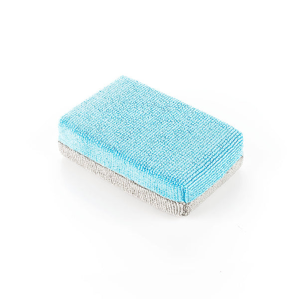 An image of a single new ULTRA No-Soak Coating Applicator from the Rag Company. These microfiber sponges feature ice grey on one side and ultra blue on the other. These sponges also have a special liner that prevents the coating from soaking through the microfiber and into the sponge.