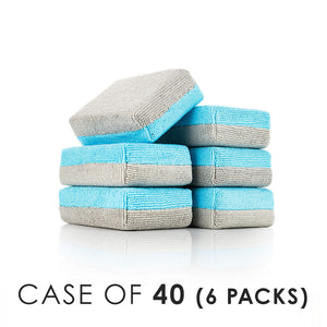 An image advertising a wholesale case of a six pack of the new ULTRA No-Soak Coating Applicator from the Rag Company. These microfiber sponges feature ice grey on one side and ultra blue on the other. These sponges also have a special liner that prevents the coating from soaking through the microfiber and into the sponge.